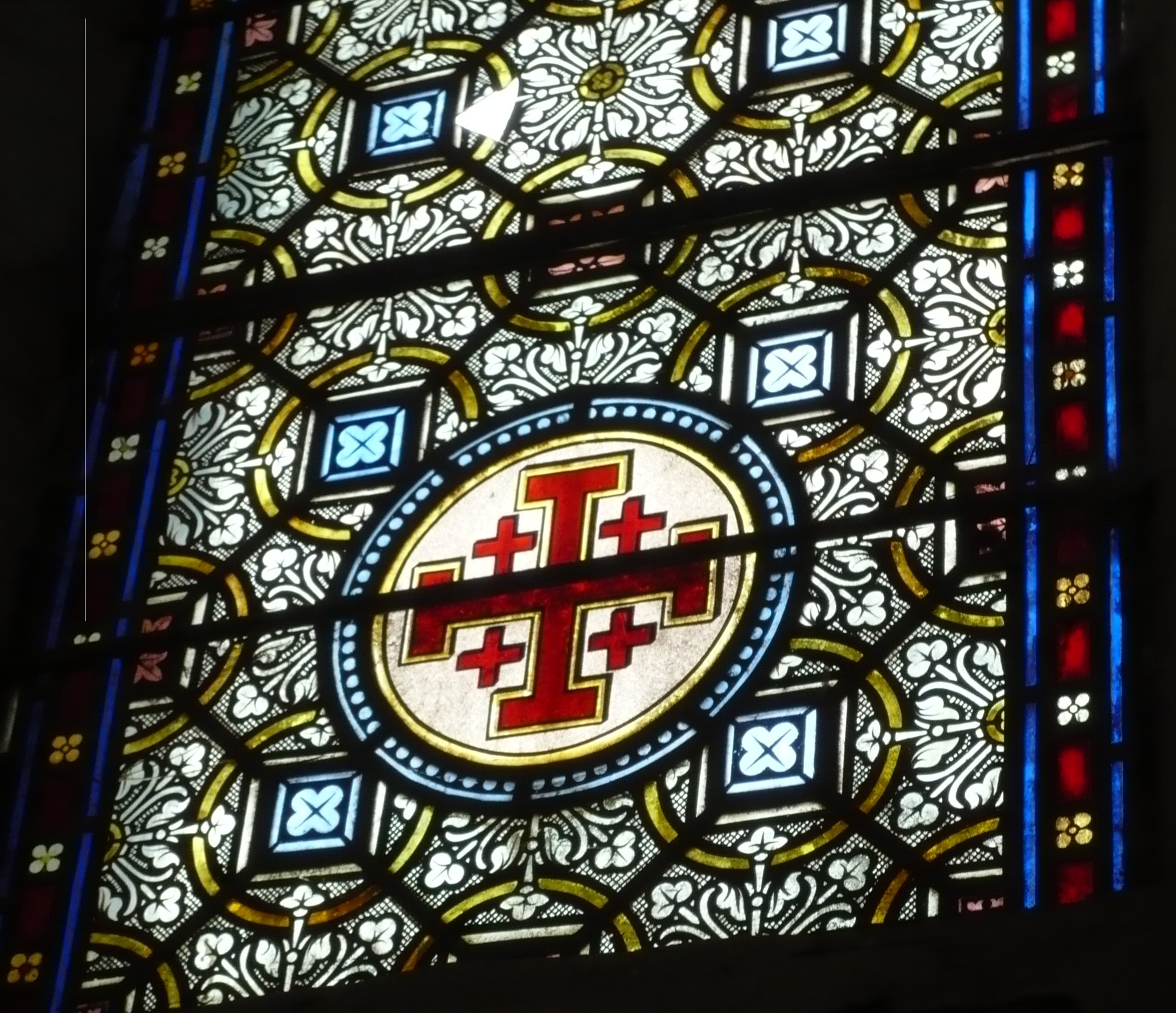 Cross of Jerusalem in window